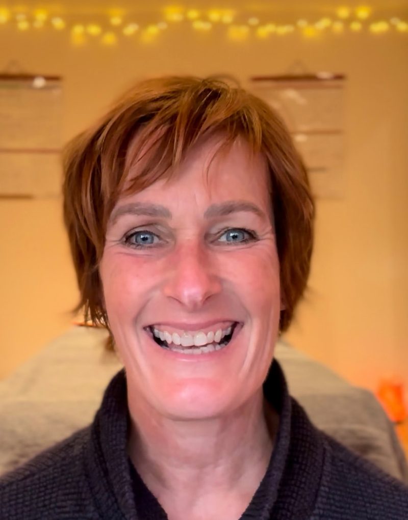 Caroline Miller, smiling, in warm light